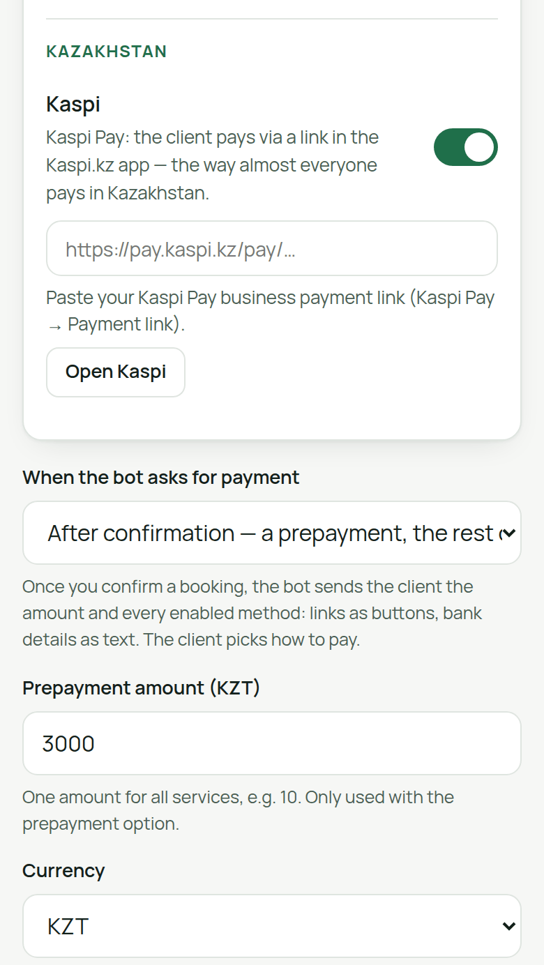 AiKlient dashboard, “Bot → Payment”: in the “Kazakhstan” group, Kaspi is switched on with the caption “Kaspi Pay: the client pays via a link in the Kaspi.kz app — the way almost everyone pays in Kazakhstan.”, a field for the https://pay.kaspi.kz/pay/… link and an “Open Kaspi” button; below, “When the bot asks for payment” is set to a prepayment after confirmation, “Prepayment amount (KZT)” is 3000 and “Currency” is KZT